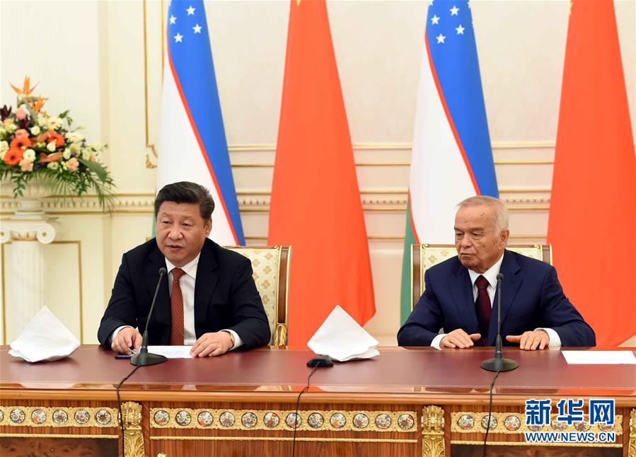 6月22日，國家主席習近平在塔什干庫克薩萊國賓館同烏茲別克斯坦總統卡里莫夫舉行會談。會談后，兩國元首共同會見記者。 新華社記者饒愛民攝